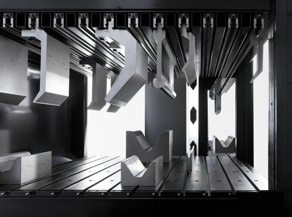 Press-brake punches and dies that determine the inside radius of a sheet metal bend